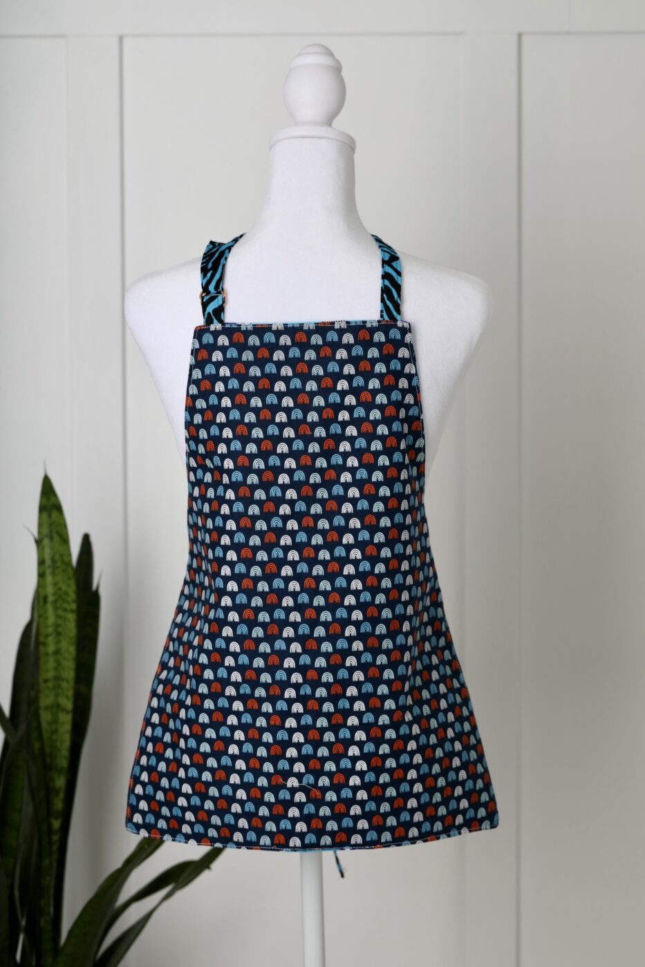 Reversible Child’s Apron – Red/Blue/White Rainbow Pattern