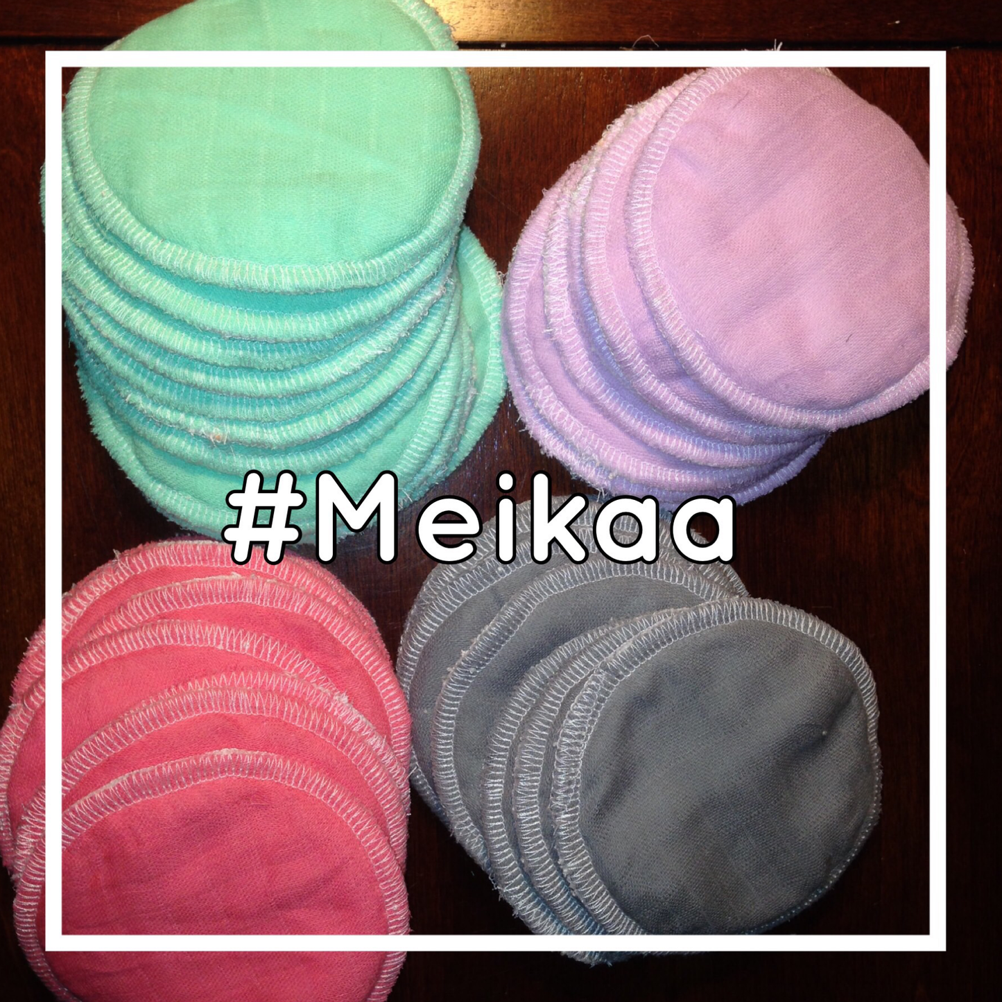 Reusable nursing pads: stacked mint, pink, lavender, and gray round pads with stitched rims