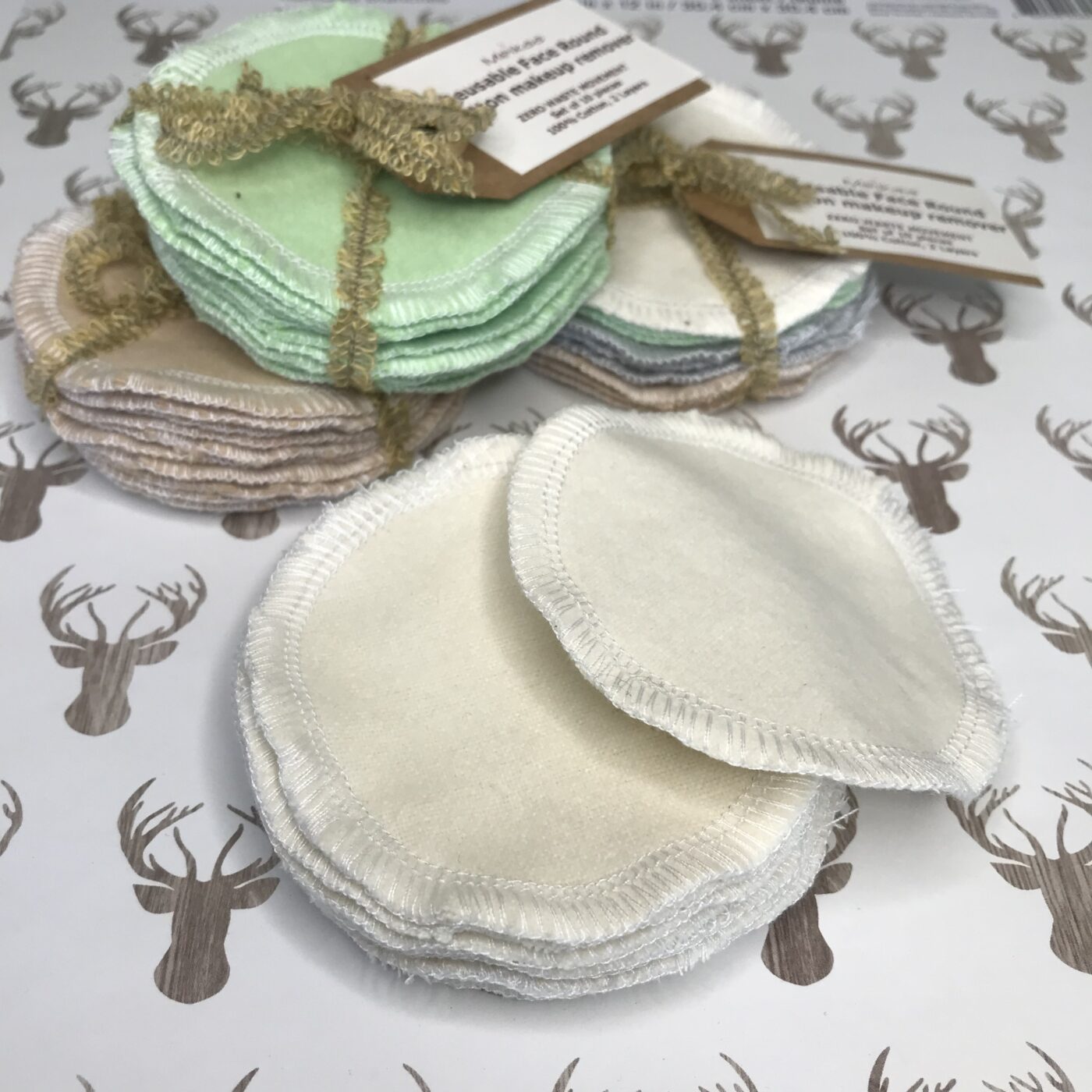 Reusable face rounds, mint green and gray/white stack of circular washable makeup pads