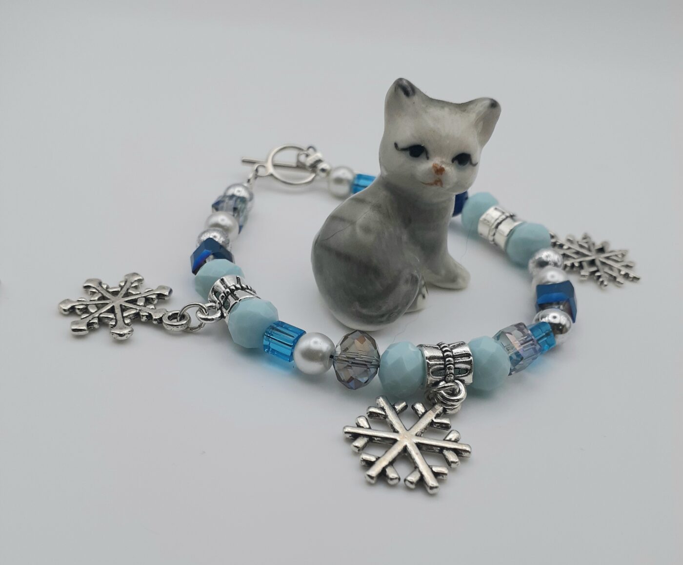 Blue Ice Bracelet Various Shades of Blue Crystal Cubes Faceted Czech Beads and 3D Tibetan Silver Snowflake Charms
