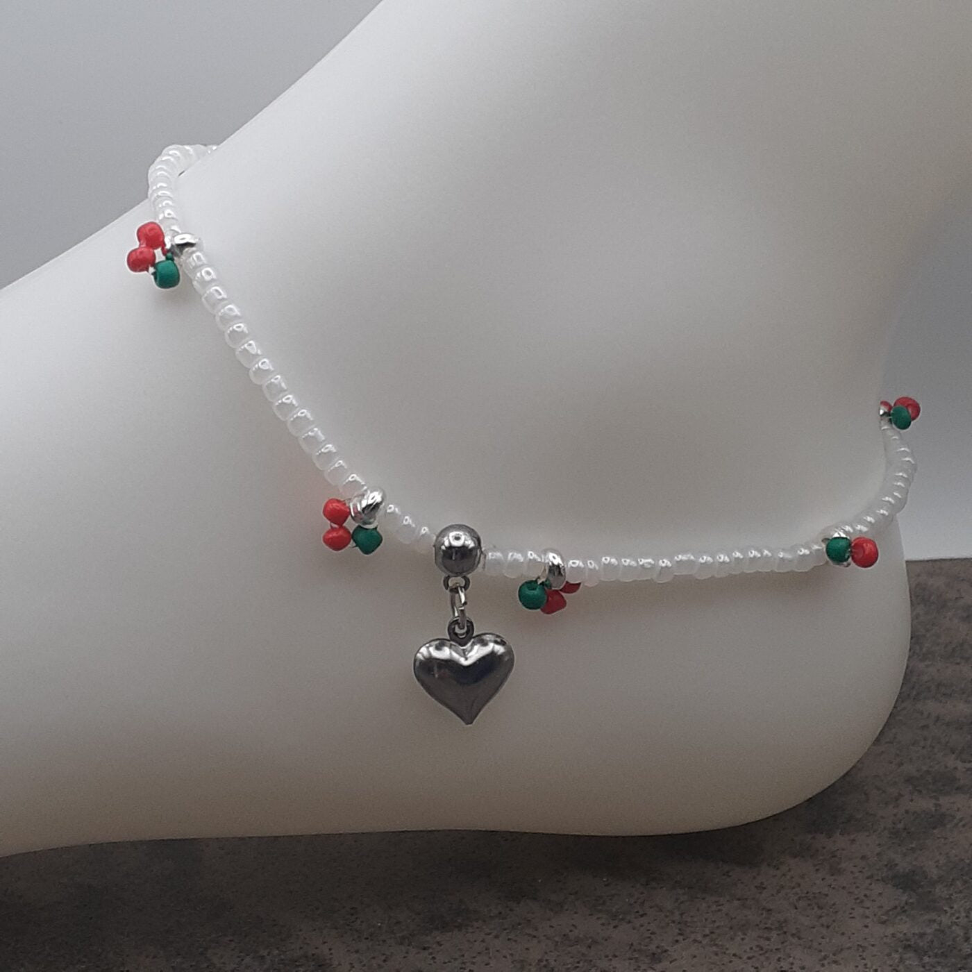 Cherry Love Stretch Anklet White Seed Beads with Little Red and Green Fruity Accents of Colourful Beads and a Puffy Silver Heart Charm