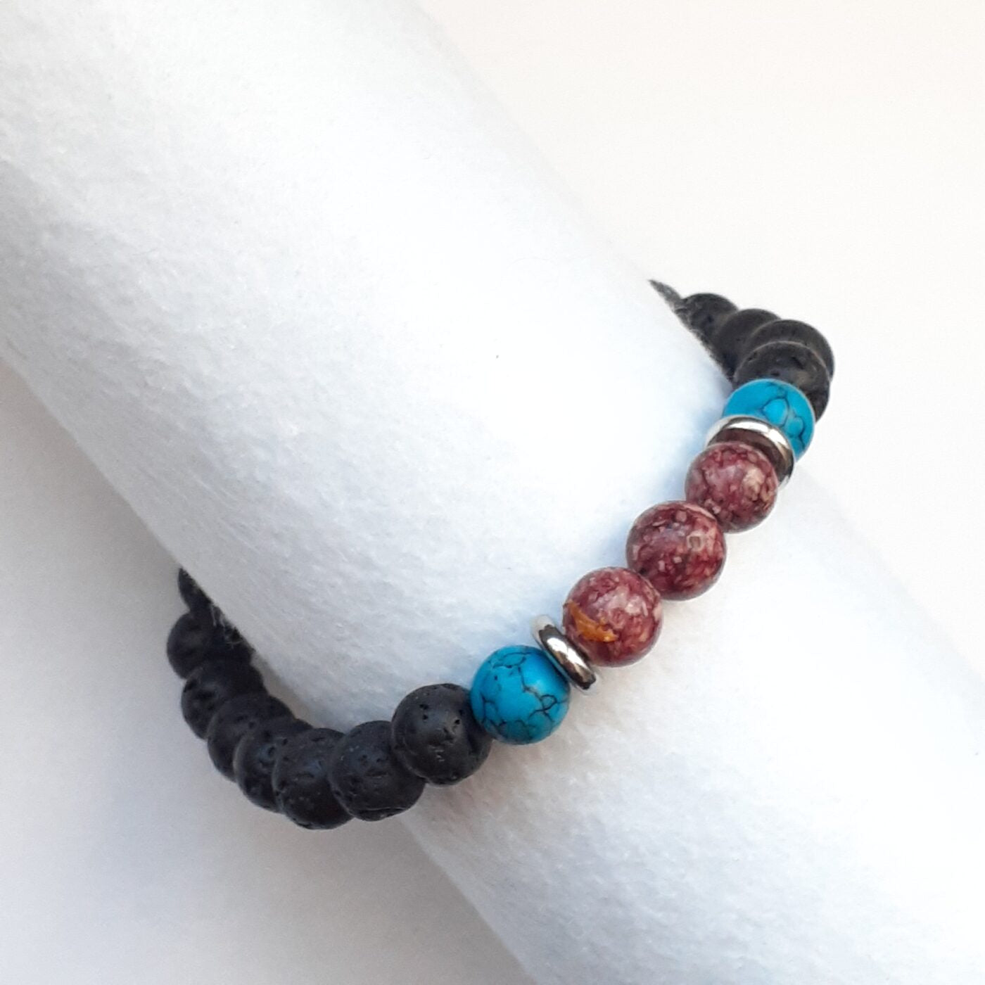 Turquoise Howlite and Red Stone Bead Black Lava Stretch Bracelet