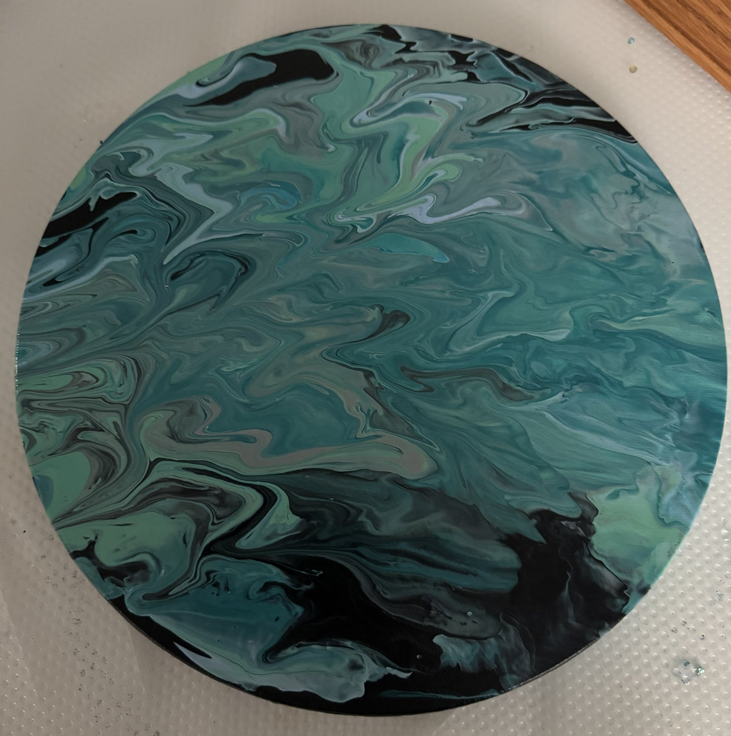Acrylic pour canvas, 12x12 in, teal and green marbled abstract with black accents