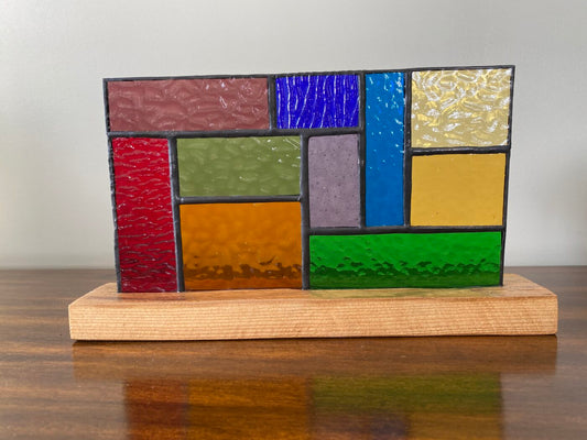 Stained Glass Geometric Design Panel on a Hardwood Base - Rainbow Colours