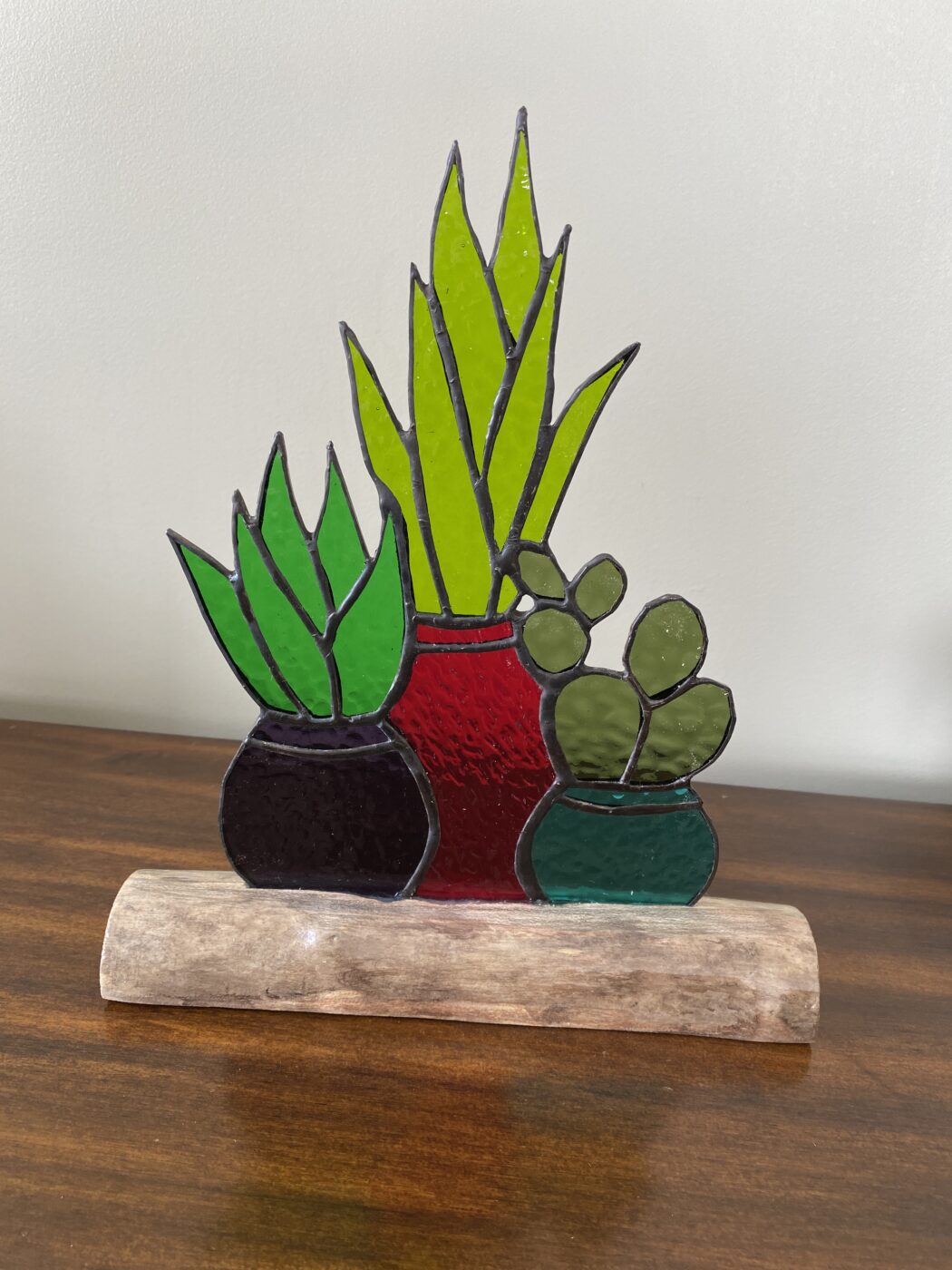 Stained Glass Panel of Three Cacti & Aloe in Clay Pots Inlaid on Driftwood Base - Purple, Red, & Aqua