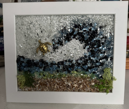 Golden turtle mosaic-style artwork in ocean wave resin frame