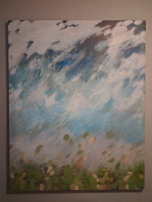 Abstract canvas wall art with misty blue clouds and green foliage
