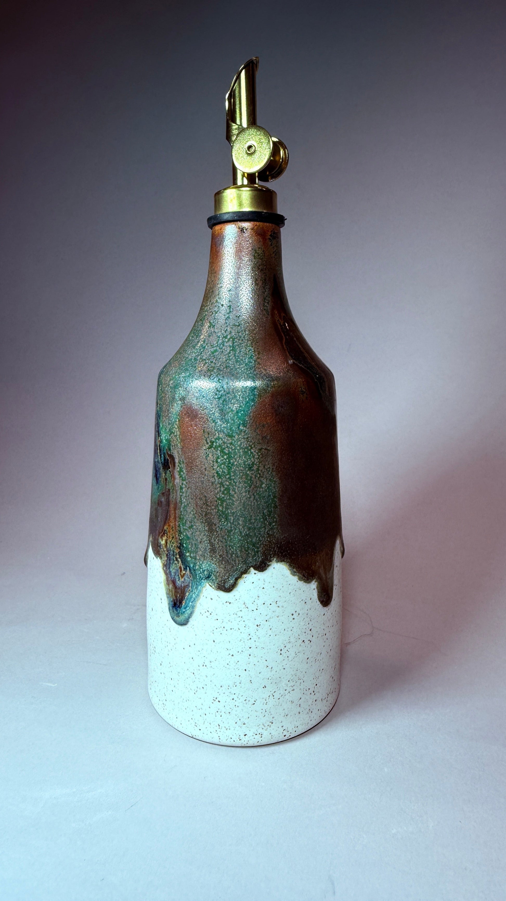Ceramic-style decanter bottle with hinged pour spout and stopper, blue-green glazed