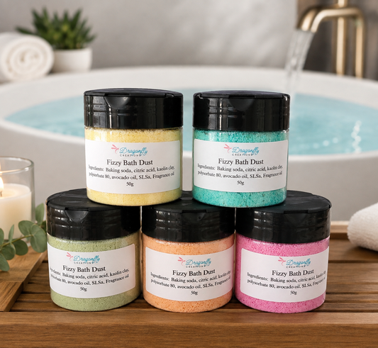 Bath dust jar set with black lids: beige, teal, green, orange, and pink powders