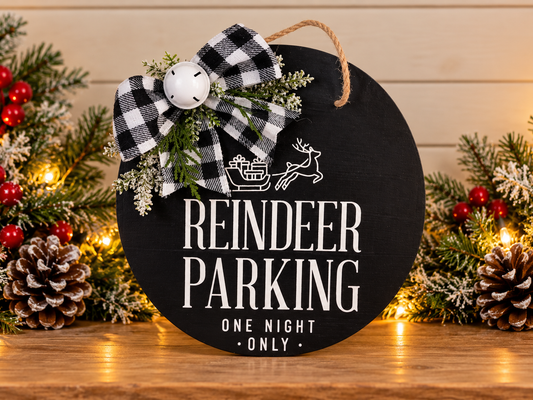 Round black door hanger: reindeer parking text, reindeer graphic, checkered bow