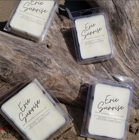 Wax melt clamshell with white square wax labeled Erie Sunrise