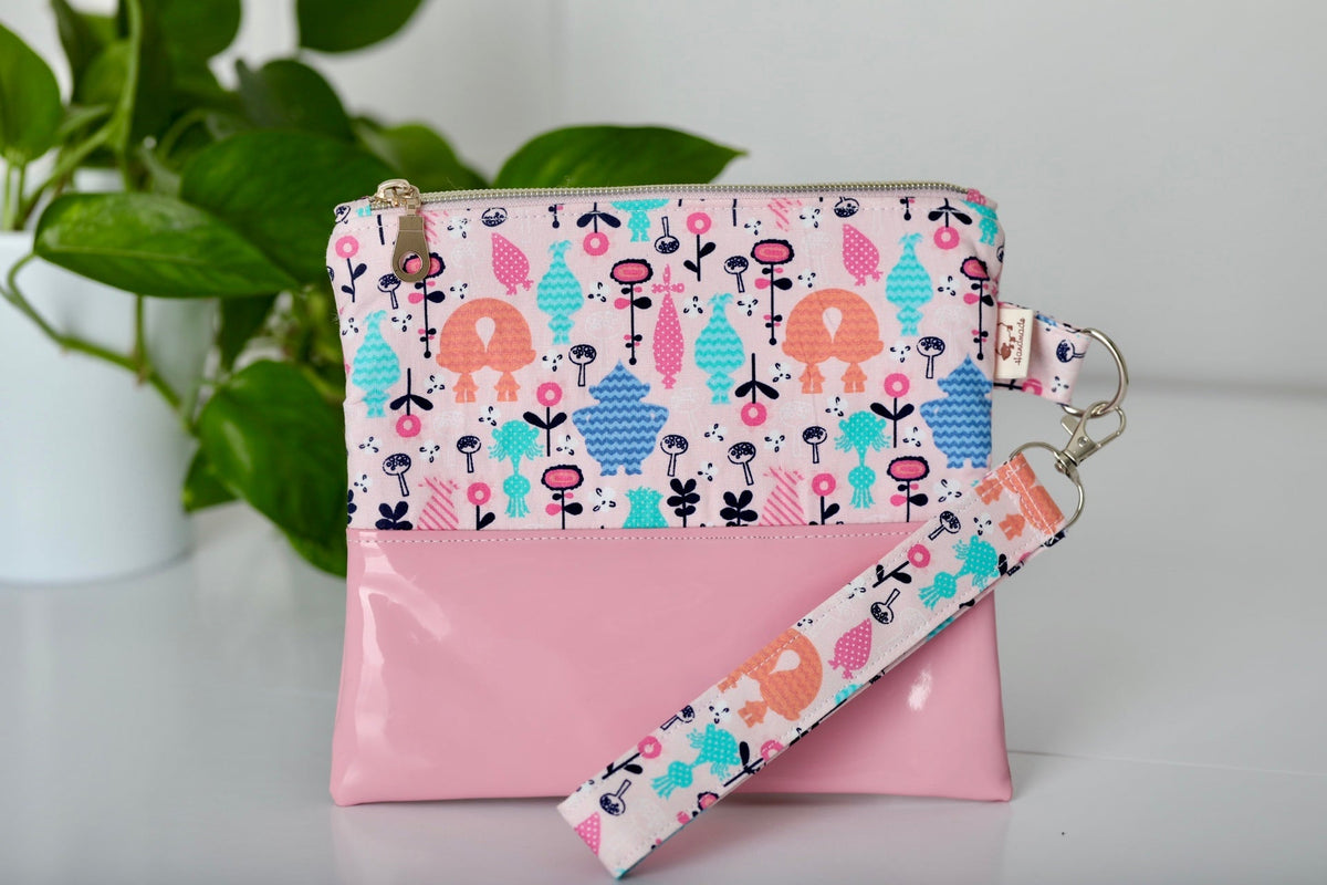 Pink and white patterned zip pencil case pouch with removable wristlet strap