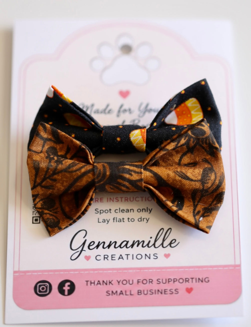 Dog bow tie with black fabric and brown floral leaf pattern