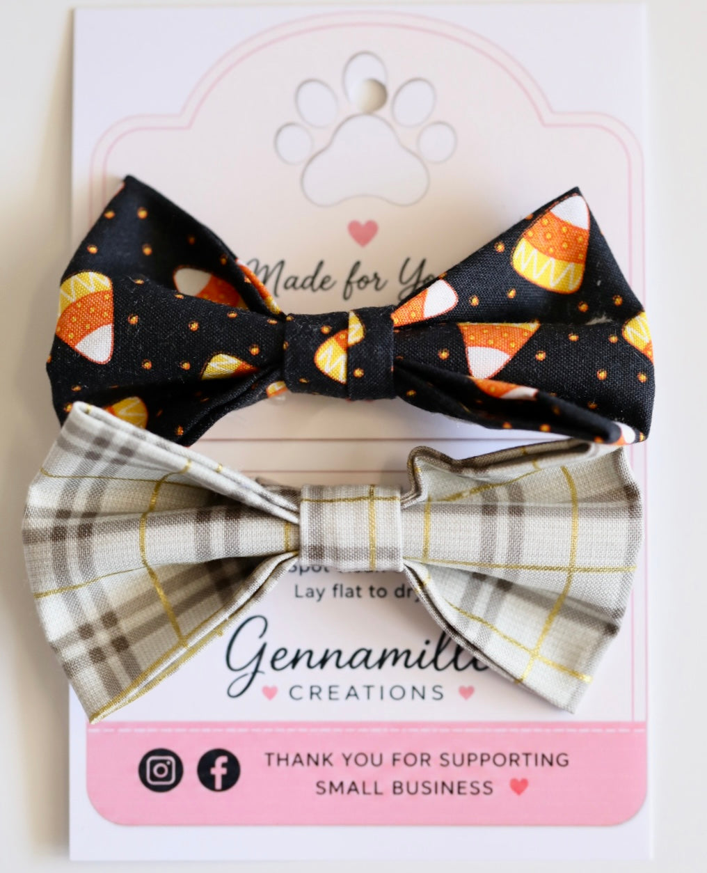 Dog bow tie with black pumpkin print on top and tan plaid on bottom