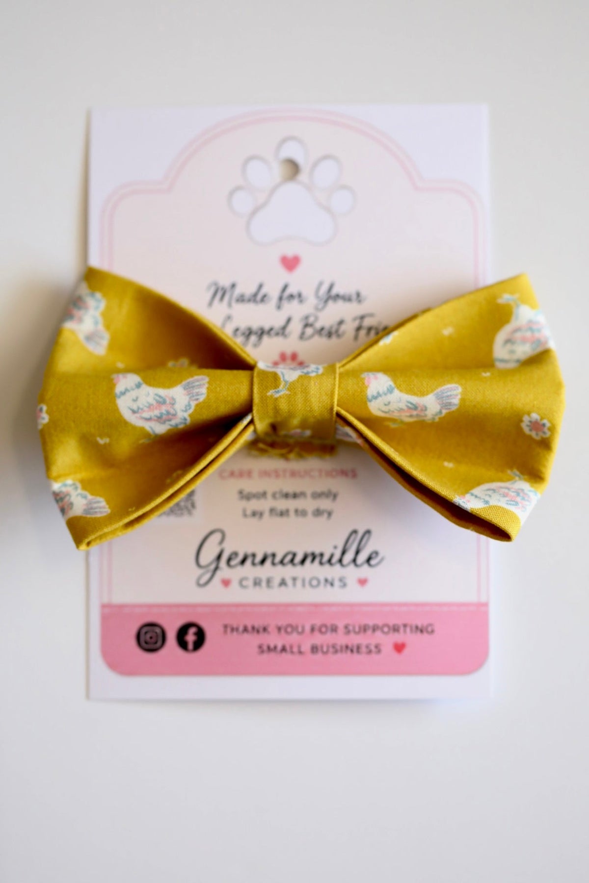 Dog bow tie with yellow fabric and small bird and flower accents