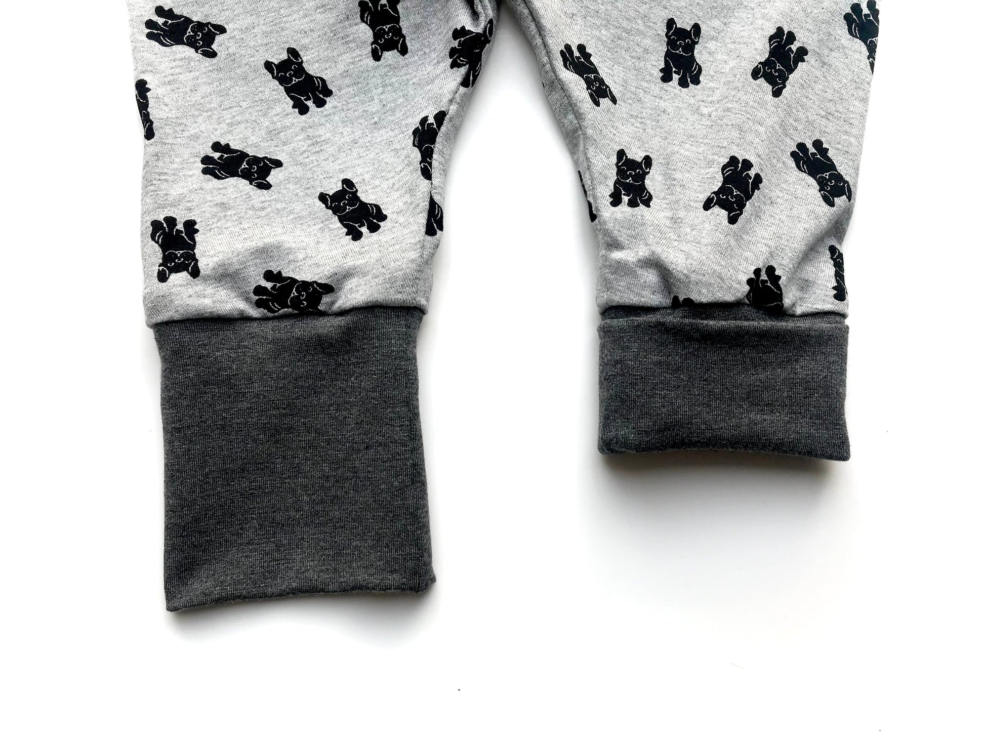 Dog print kids grow-with-me harem pants with gray cuffs and light heather fabric