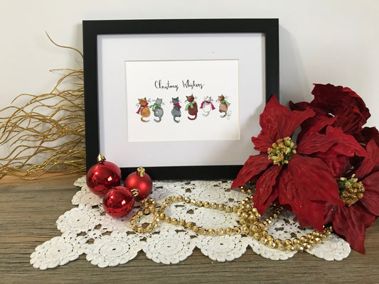Framed Christmas Whiskers wall print with small illustrated characters on white