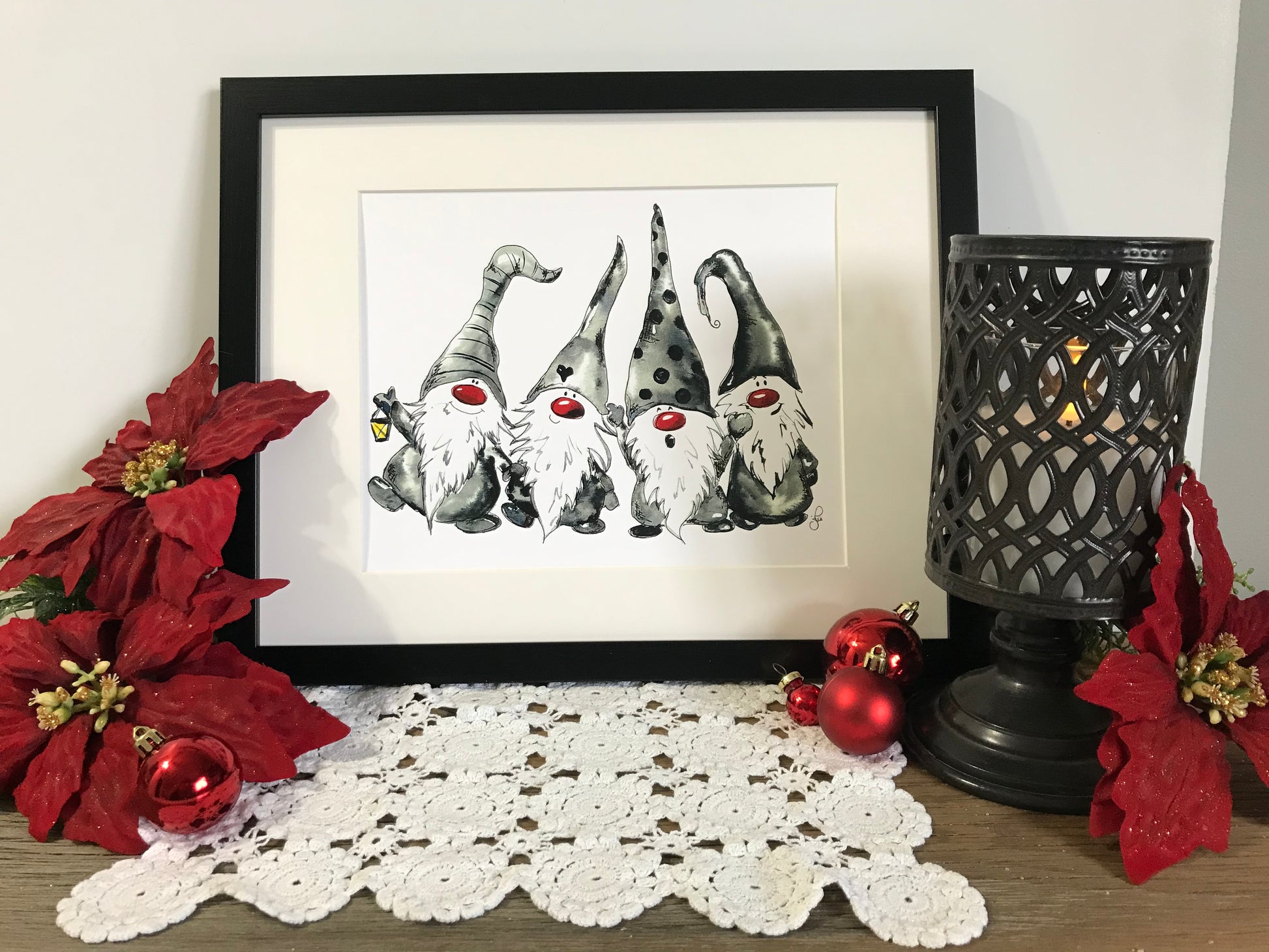 Framed gnome family wall art with four gray gnomes, red noses and hearts