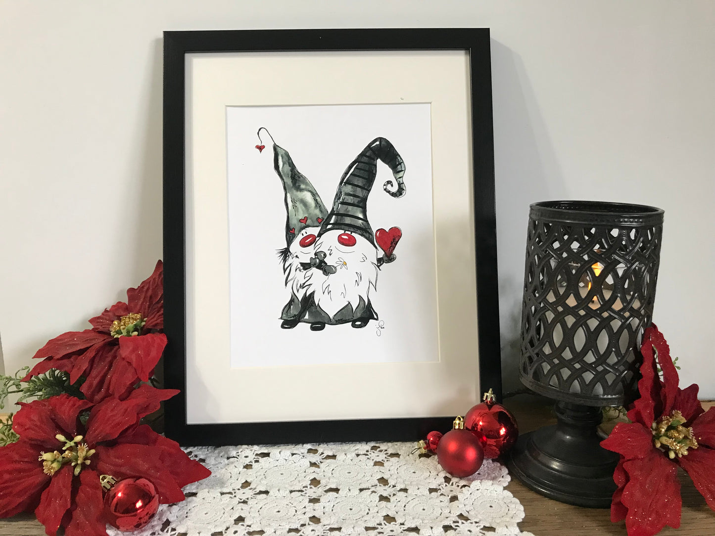 Black-framed gnome love couple art print with red hearts and heart balloon
