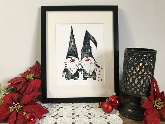 Framed gnome couple wall art with two dark hats and red heart accents