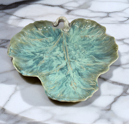 Rhubarb-leaf footed ceramic platter, glazed turquoise-blue with scalloped edges