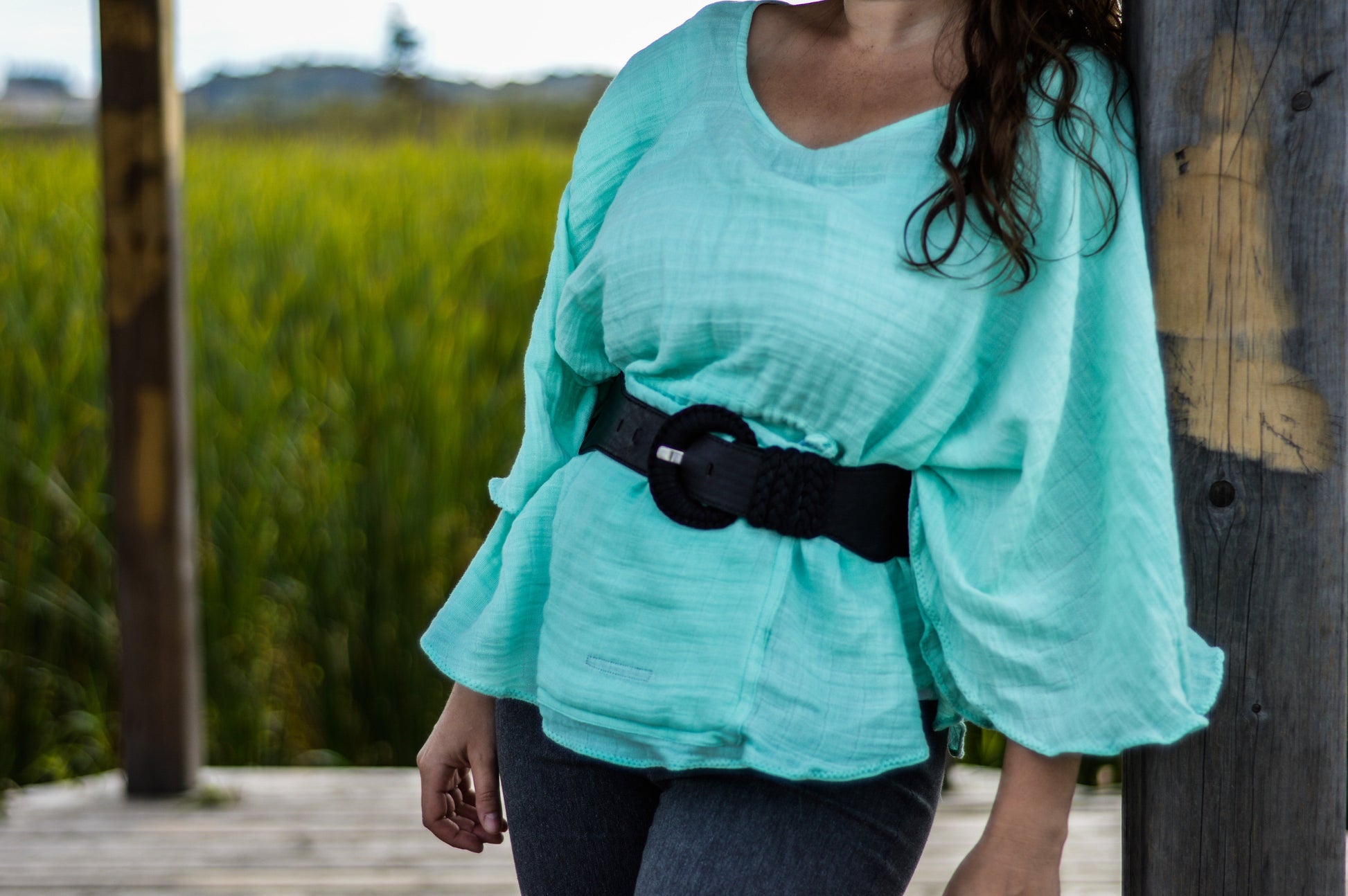 Turquoise breastfeeding cover with black waist strap, loose bell sleeves