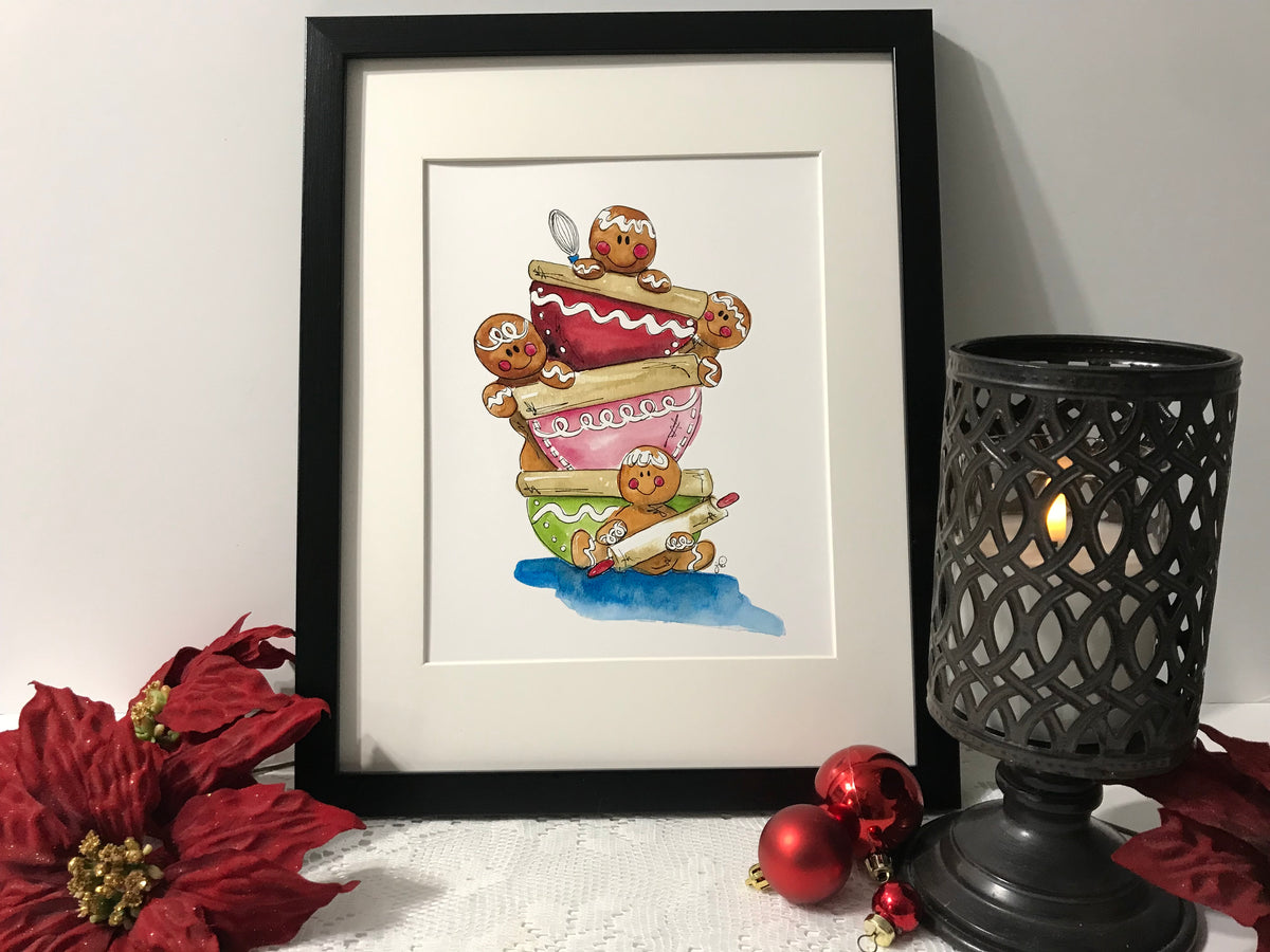 Framed illustration of stacked gingerbread men with icing and candy details