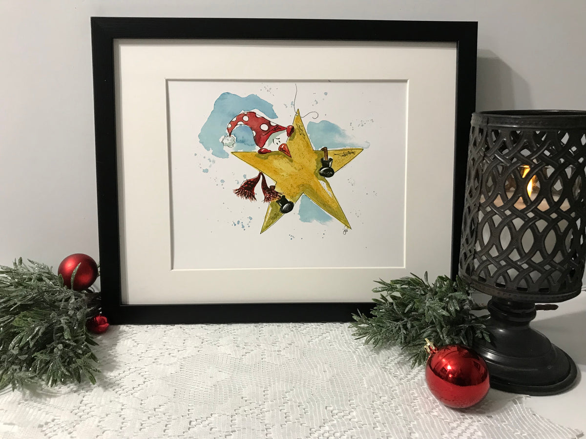 Framed wall art print of a large gold star with red birds and blue sky splash