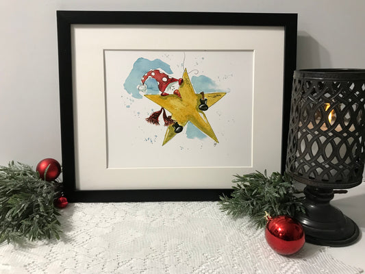 Framed wall art print of a large gold star with red birds and blue sky splash