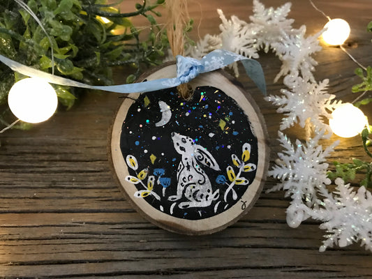 Hand-painted rabbit wooden ornament: round blue night scene with hanging fabric loop