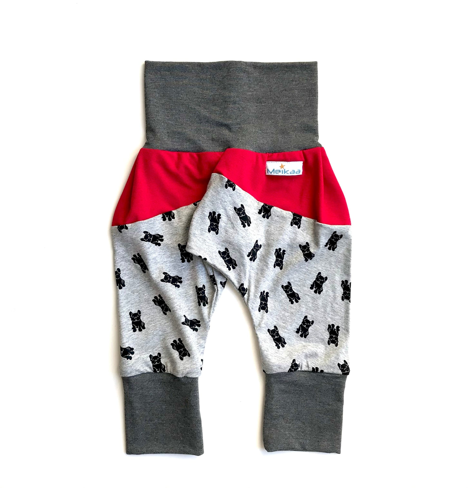Kids grow-with-me harem pants with dog print, red waistband panel and gray leg cuffs