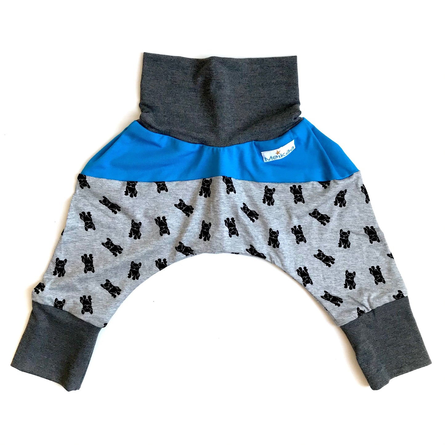 Kids grow-with-me harem pants with dog print, bright blue waistband panel and gray cuffs