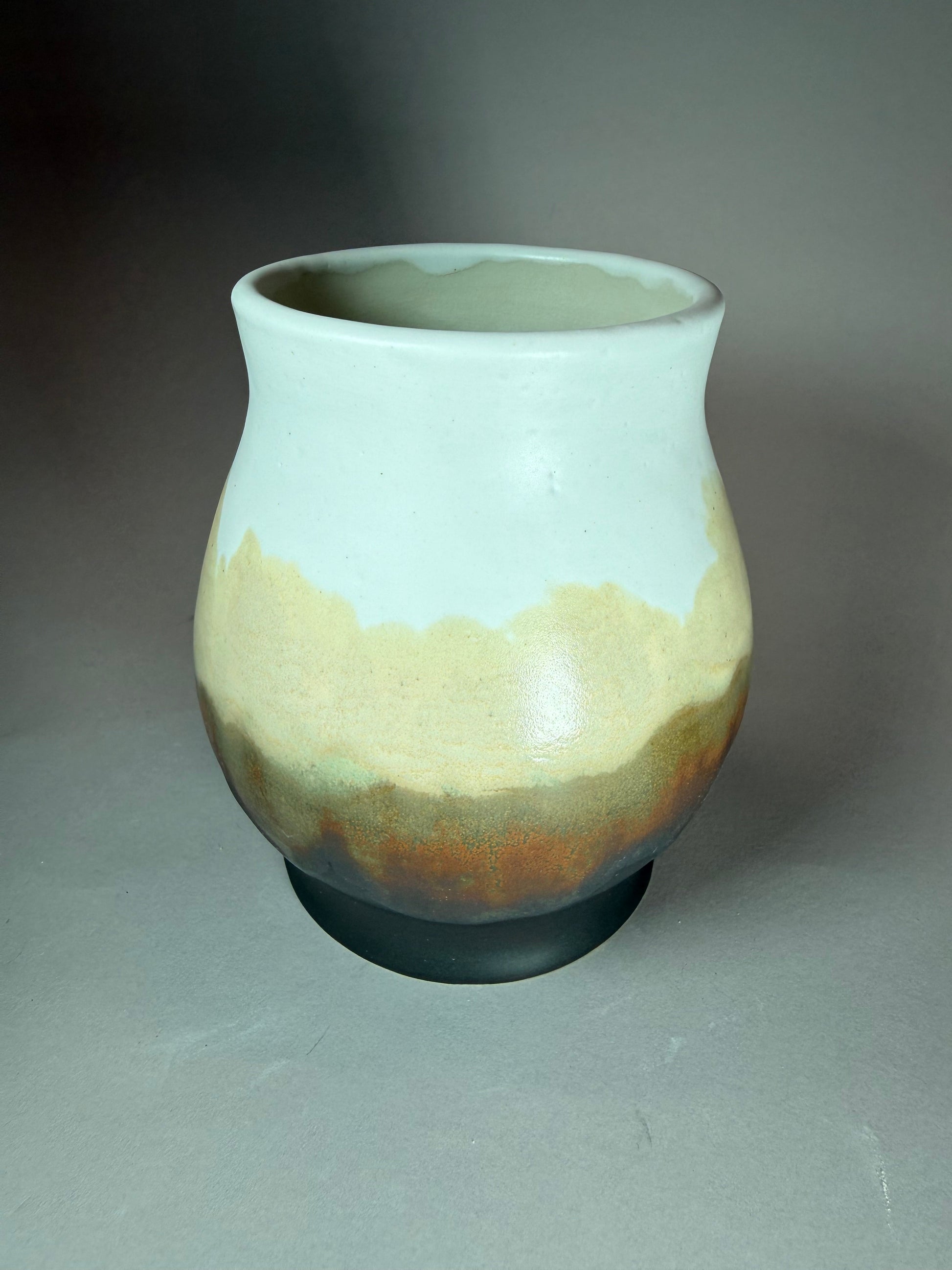 Meadowlight ceramic vase with teal rim and green-brown glazed body