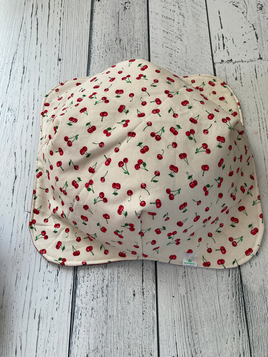 White bowl cozy with red cherries and green leaves pattern