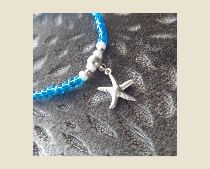 Azure Sparkling Blue Seed Bead Stretch Style Bracelet with White Seed Beads and Shiny Silver Spacer Beads and 3D Starfish Charm