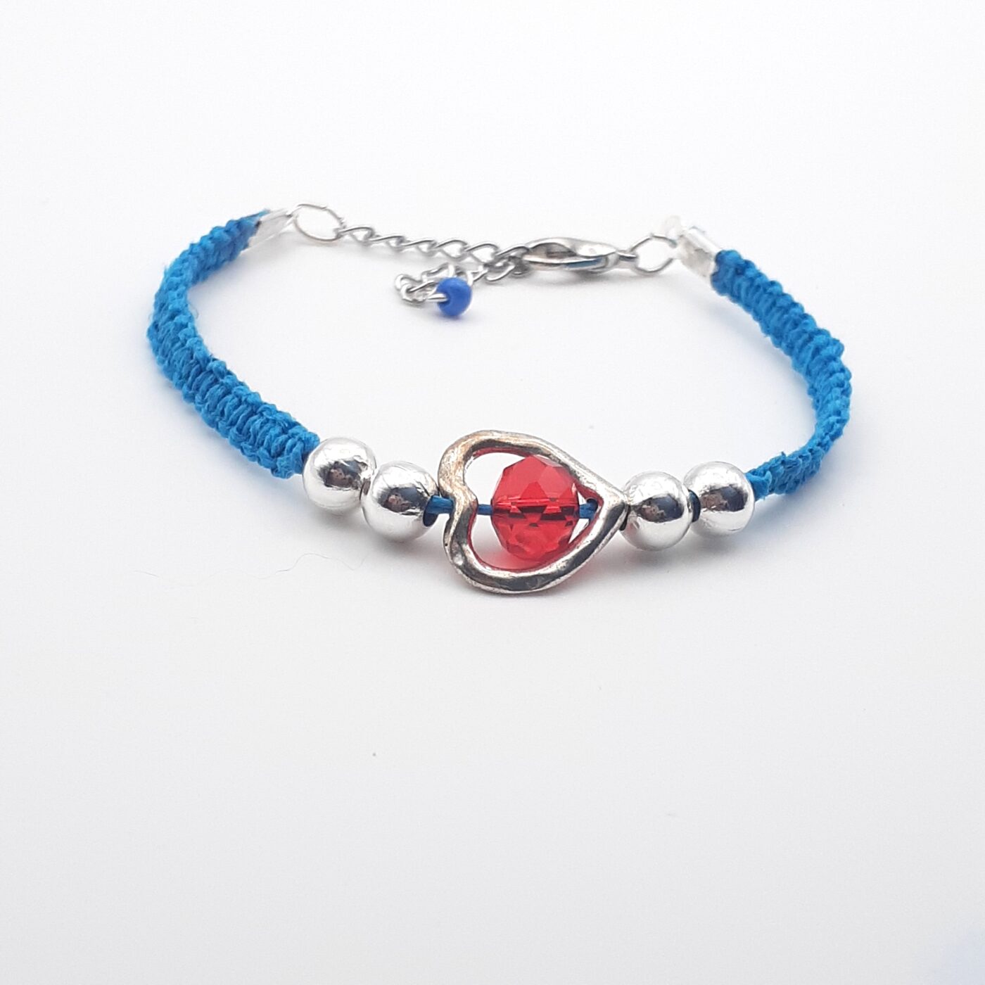Rich Blue Hemp Macrame Cord Bracelet with Red Faceted Crystal Focal Bead inside a Heart-Shaped Charm