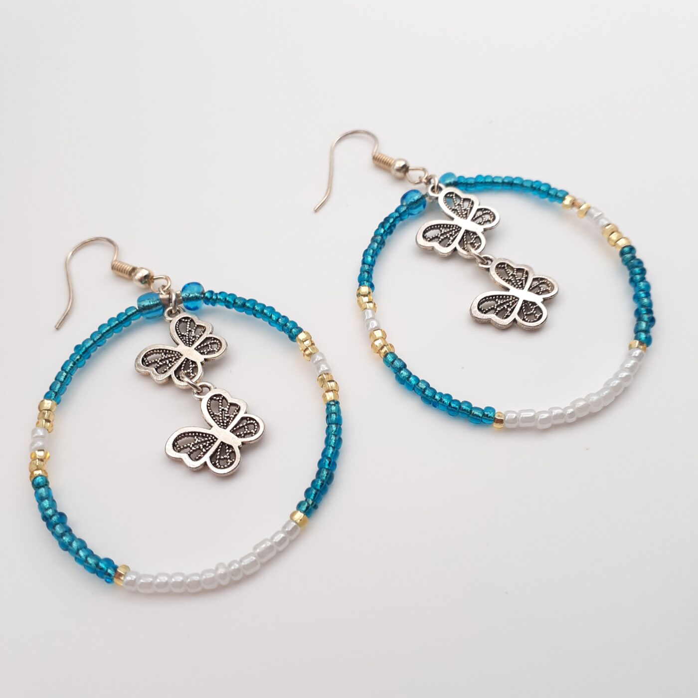 Blue and White Seed Bead Hoop Earrings with 2 Tiny Butterfly Charms in each Hoop