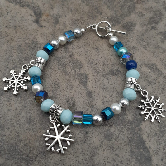 Blue Ice Bracelet Various Shades of Blue Crystal Cubes Faceted Czech Beads and 3D Tibetan Silver Snowflake Charms
