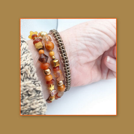 Brown suede leather bracelet with bronze ball chain and button closure