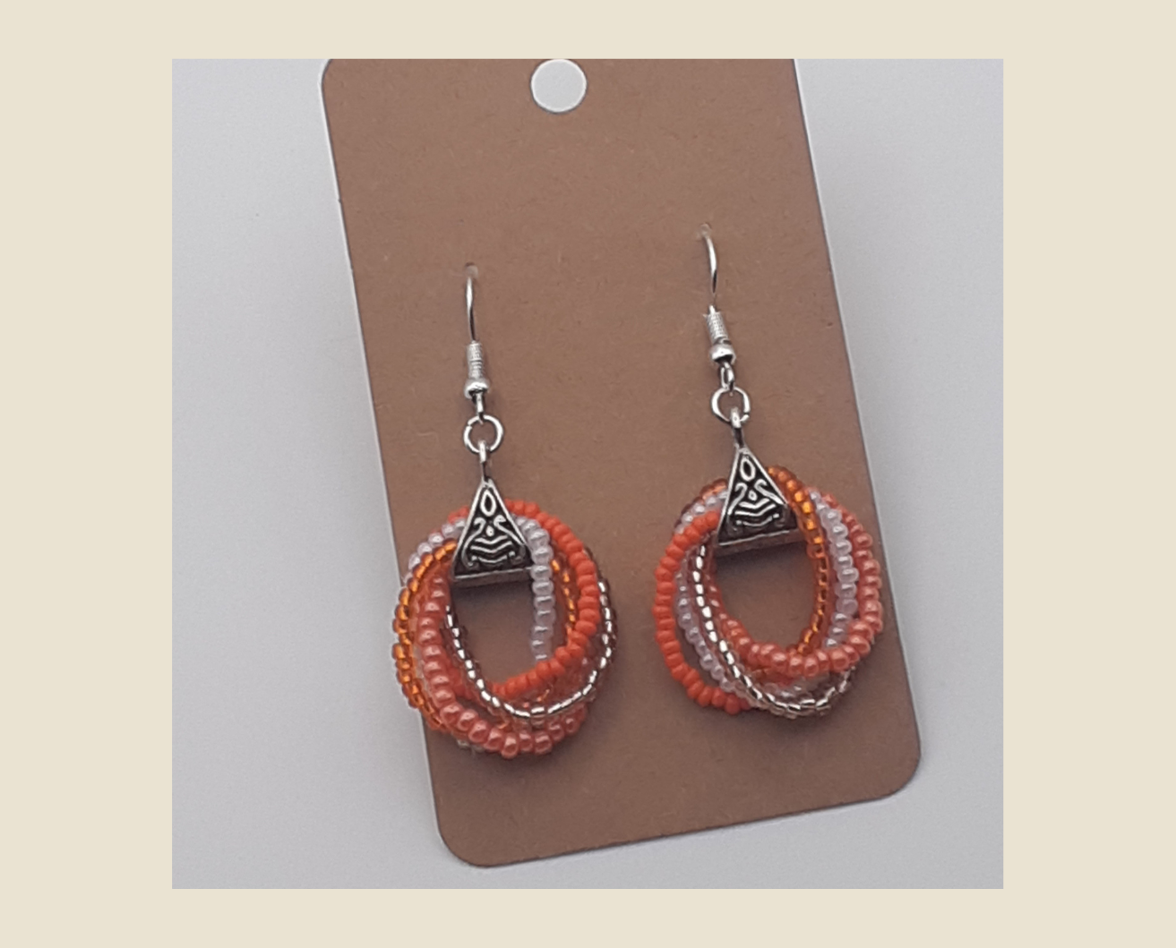 Citrus Swirl Earrings with Bright Orange and Pure White Czech Seed Beads