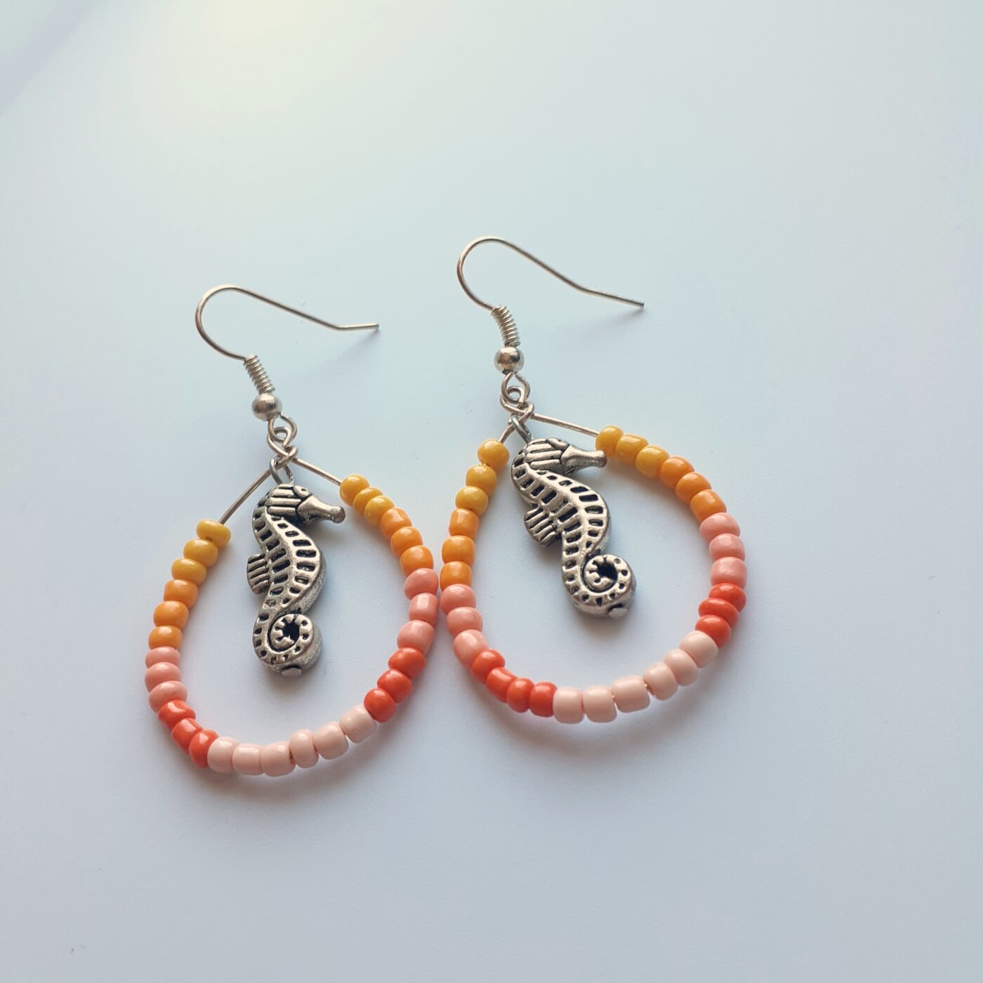 Coral Seed Bead Hoop Earrings with 3D Tibetan Silver Seahorse Charms