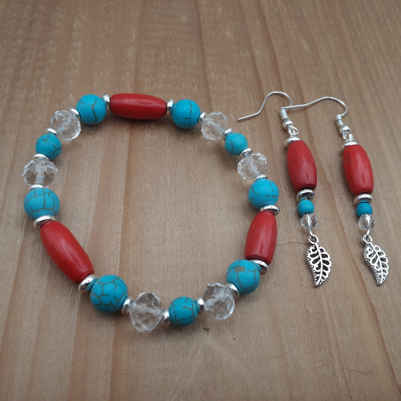 Crimson Tide Earrings and Stretch Beaded Bracelet Jewellery Set in Red Wood and Dyed Turquoise Howlite Stone and Clear Crystal with Silver Leaf Charms