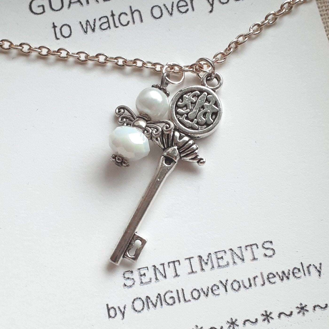 Opaque White Faceted Czech Crystal and Pearl Tiny Guardian Angel Charm and Tibetan Silver 3D Key Charm on a Sterling Silver Necklace Chain