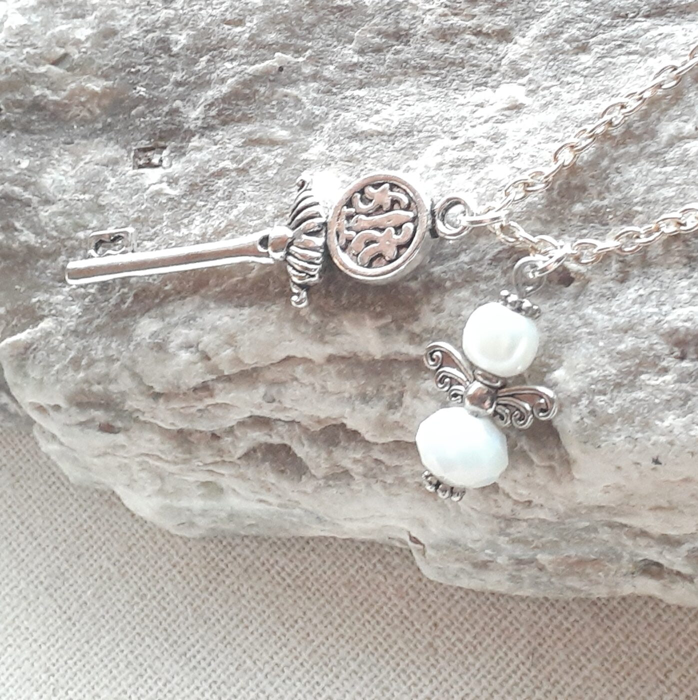 Opaque White Faceted Czech Crystal and Pearl Tiny Guardian Angel Charm and Tibetan Silver 3D Key Charm on a Sterling Silver Necklace Chain