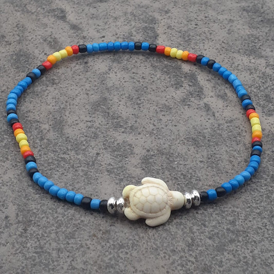 Seaturtle Sensation Colourful Seed Bead Anklet in Bands of Blues, Sunny Yellows, Reds, and Black