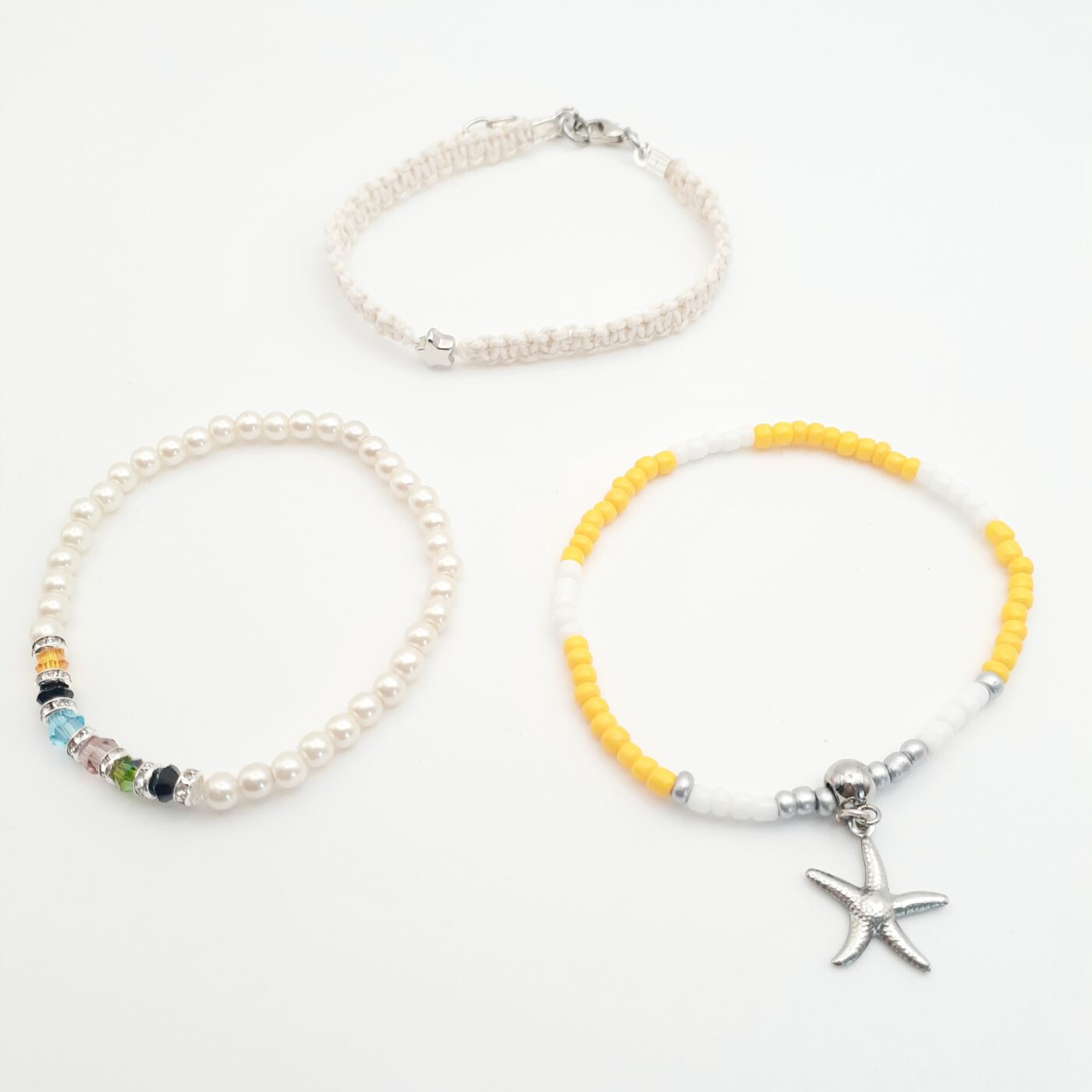 Set of 3 Thin White Hemp Macrame Star Bracelet with a White Pearl and Colourful Swarovski Crystal Bracelet plus a Sunny Yellow and Silver Seed Bead Bracelet