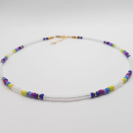 Short White Seed Bead Necklace with Splashes of Vibrant Colour Bands