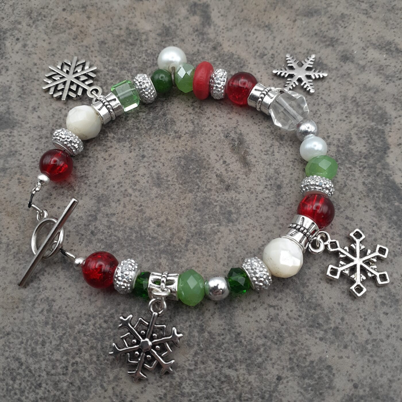 Snowflake Fantasy Bracelet in Red and Green Beads and White Pearls with Tibetan Silver 3D Snowflake Charms