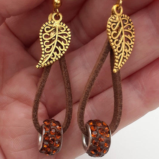 Soft Suede Leather Dangle Earrings with Gold Filigree Leaf Charms and Sparkling Orange Rhinestone Encrusted Beads
