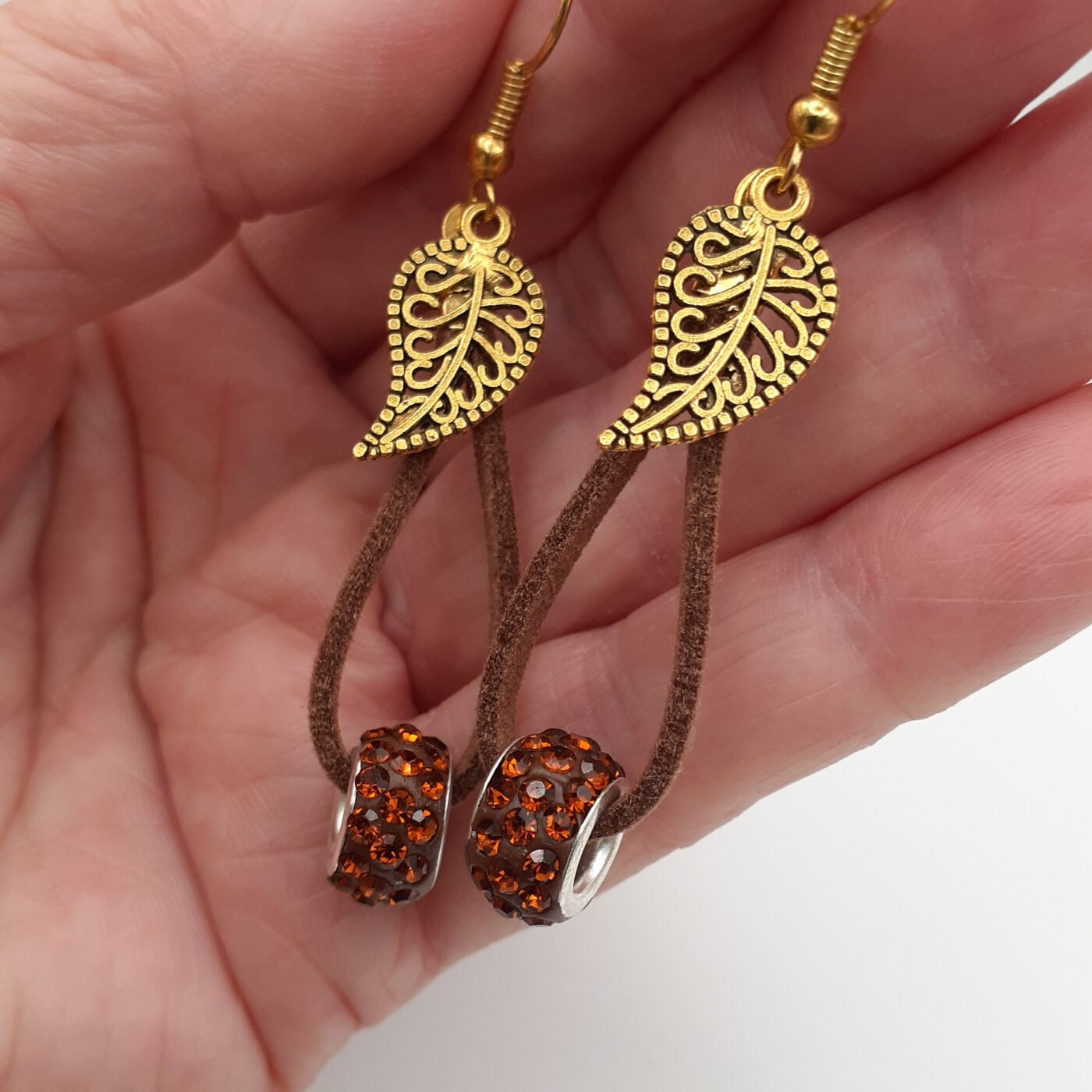Soft Suede Leather Dangle Earrings with Gold Filigree Leaf Charms and Sparkling Orange Rhinestone Encrusted Beads